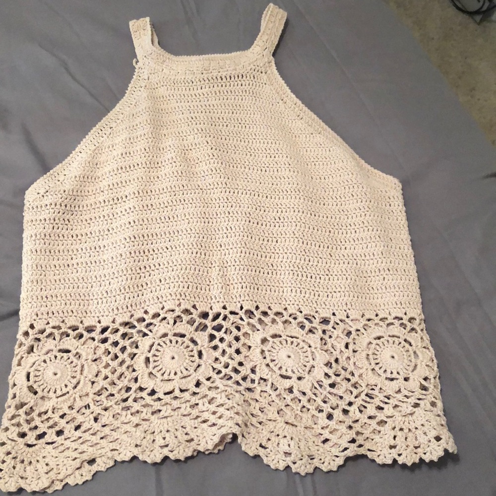 Cream colored knitted shirt
